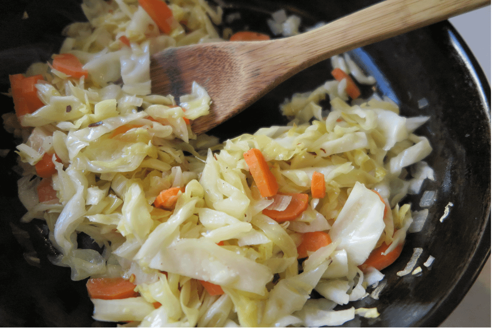 Cabbage cooking in a skillet