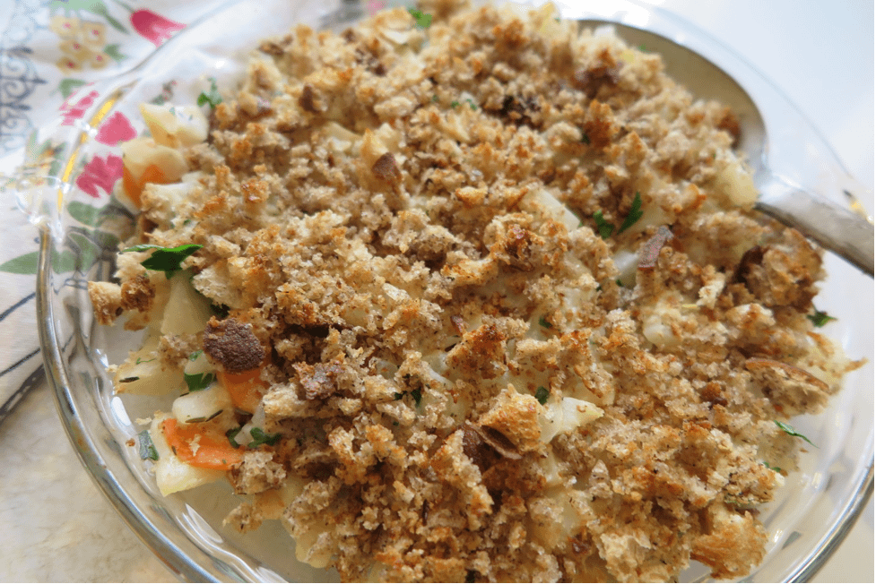 Photo of finished kohlrabi bake in a dish, primarily showing the breadcrumb topping